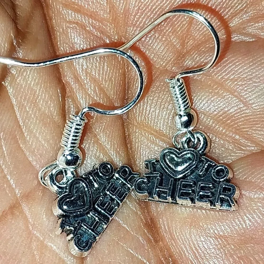 Hand crafted antique cheerleader earrings